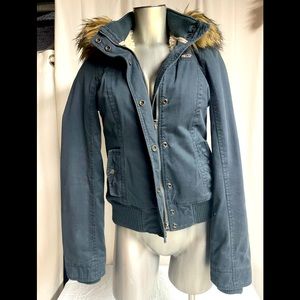 Fluffy lined jacket by Hollister. Size am